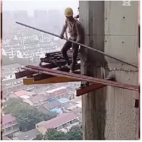 Construction Worker on Narrow Beam