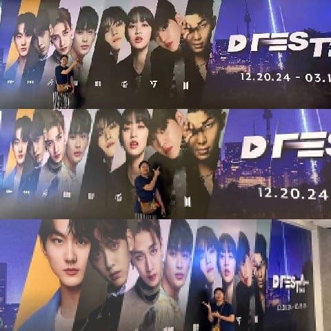 Person Pointing at Event Posters