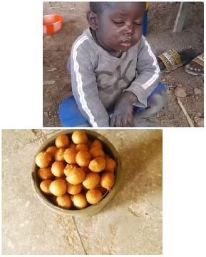 Child with Dirty Face and Snacks