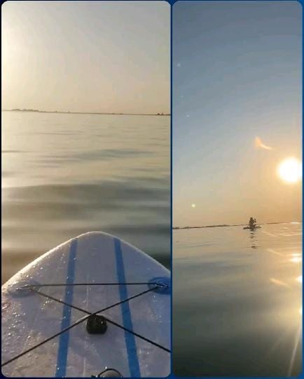 Paddleboarding Towards the Horizon