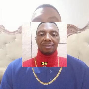 Man in Red Turtleneck and Gold Chain