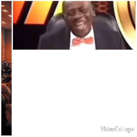 Man in Suit Smiling in Chair