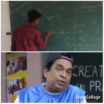 Man Writing Chemistry on Blackboard