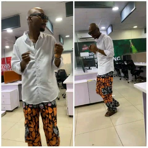 Man Dancing in Office Environment