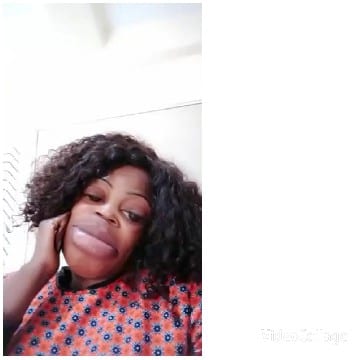 Person with Curly Hair Smiling