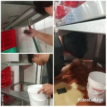 Cleaning Commercial Kitchen Scene