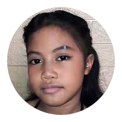 Young Girl with Brick Wall