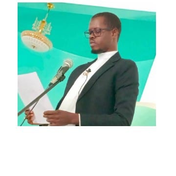 Person Speaking at a Microphone