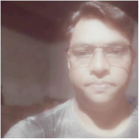 Person in Dimly Lit Room