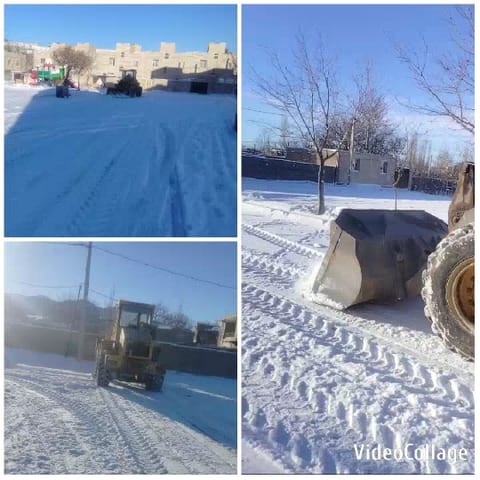 Vehicles Clearing Snow Outdoors