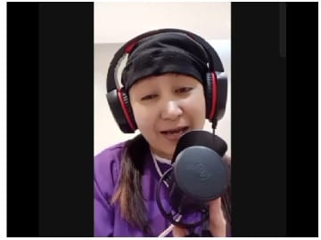 Singing into Microphone at Home