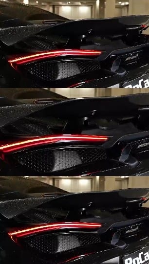 Luxury Car Rear with Glowing Tail Lights