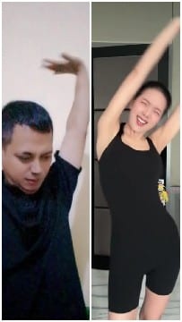 Raised Arms in Indoor Setting