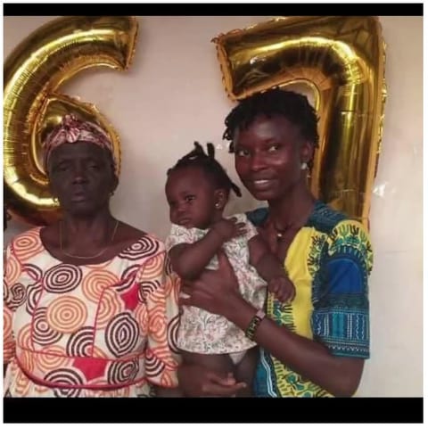 Family Posed with Golden Balloons