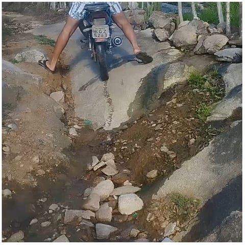 Motorcycle Ride Over Rough Terrain