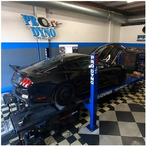 Black Car on Dynamometer for Testing