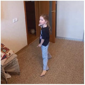 Child Sitting in a Room