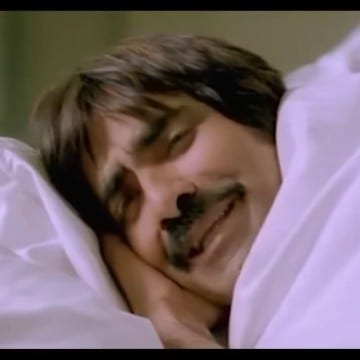 Relaxed Person in Bed
