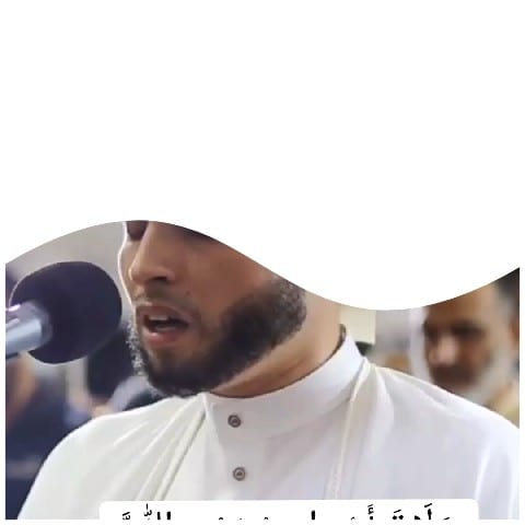 Person Singing into a Microphone