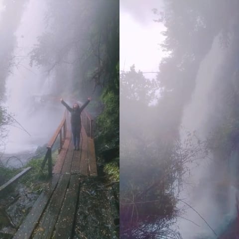 Misty Walkway Beside Waterfall