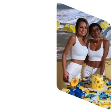 Smiling Duo at Decorated Table