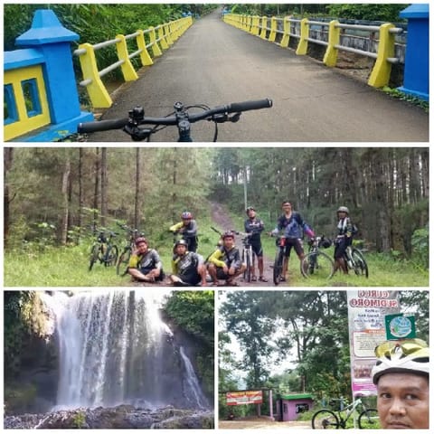 Road, Cyclists, Waterfall, and Park Entrance