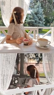 Young Girl Enjoying Dessert Outdoors