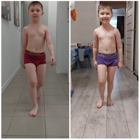 Boy in Red and Purple Shorts