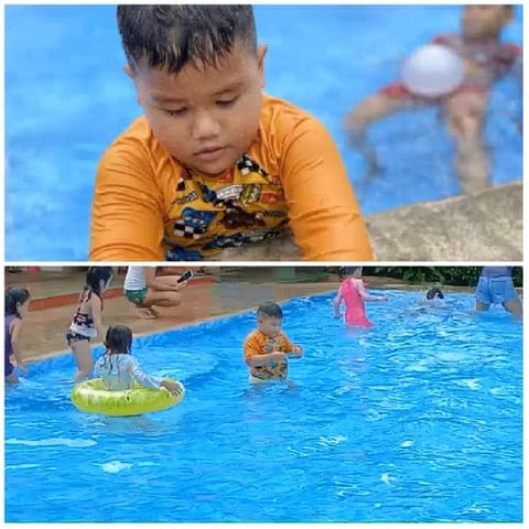 Children Playing in Swimming Pool