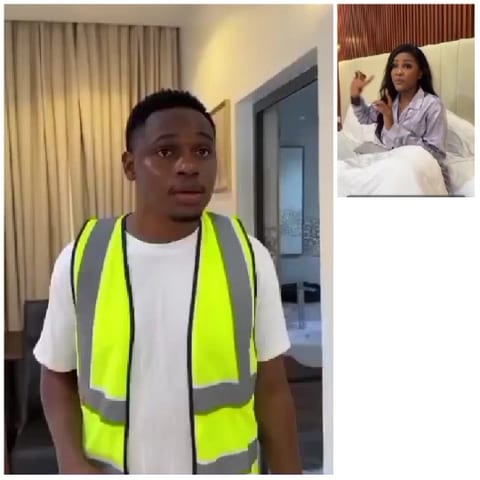 Surprised Person in Safety Vest Indoors