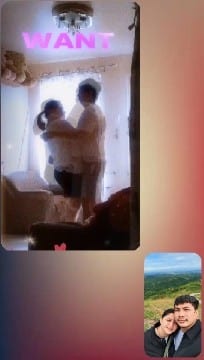 Couple Embracing in Well-Lit Room