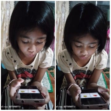 Girl Focused on Smartphone