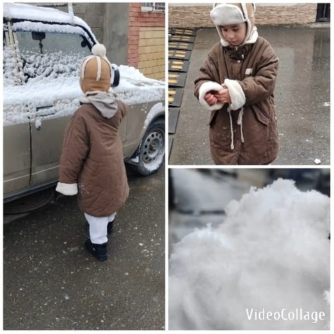 Child Playing in Snow