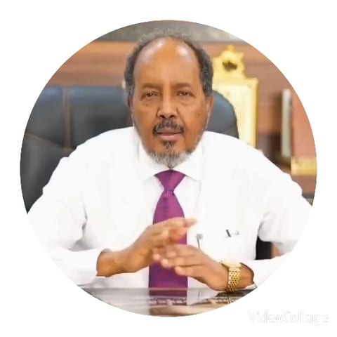 Man Gesturing in Office Setting