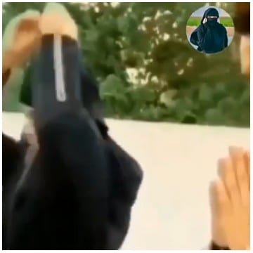 Person with Arms Raised Outdoors
