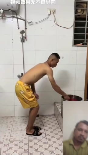 Man Leaning Over Basin in Tiled Room