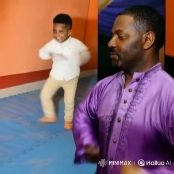 Child Dancing and Adult Observing
