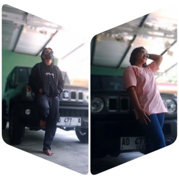 Friends Posing by Vehicle in Garage