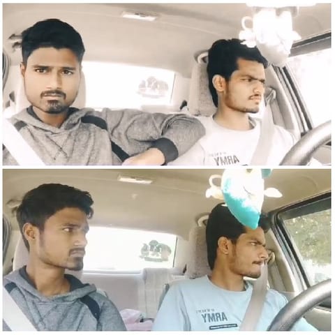 Young Men Seated in Car