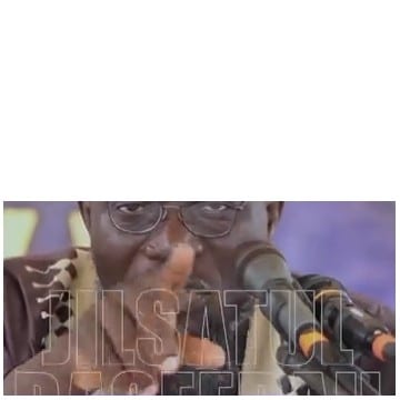 Person Speaking into Microphone