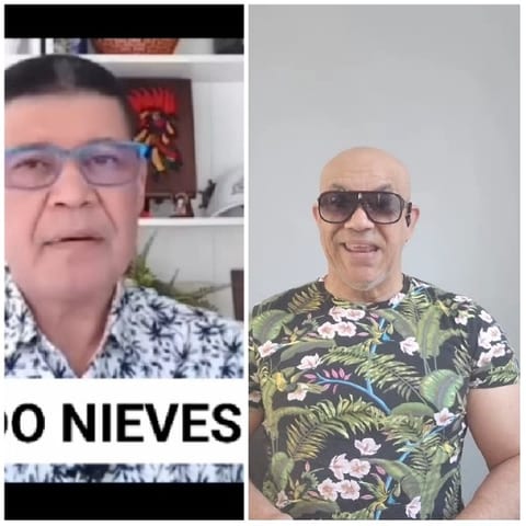 Two Men in Floral Shirts Indoors