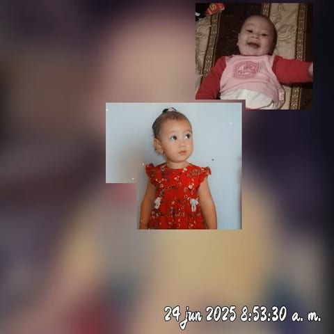 Child in Red Dress and Smiling Baby