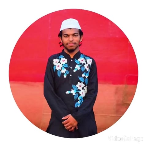 Person in Floral Outfit by Wall
