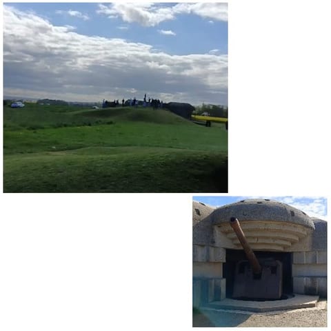 Group on Hill by Historic Structure