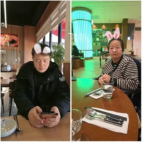 People with Rabbit Ear Filters in Cafe