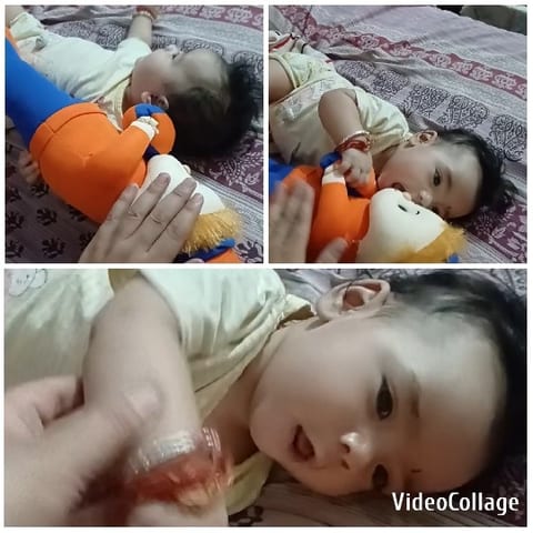 Baby Playing with Colorful Toy
