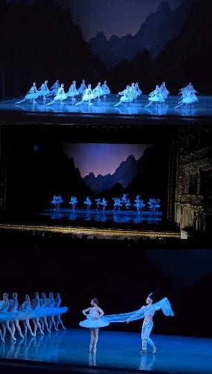 Ballet Dancers Under Blue Lighting