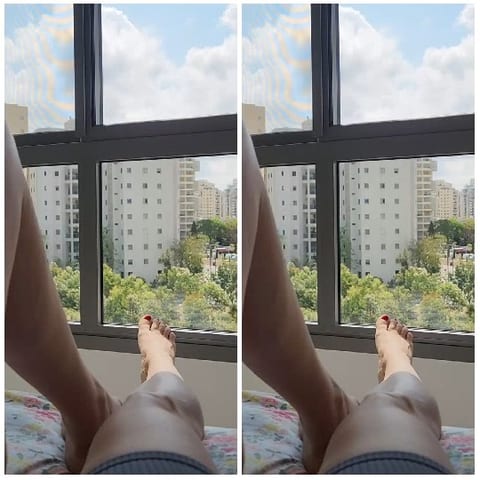 Feet Pointing Towards Cityscape