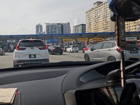 Car View Approaching Toll Booth