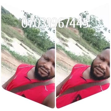 Mirrored Man in Red Shirt